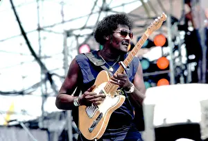 Iconic Concert Prints: Celebrate the Unforgettable Music Event That United the World: Albert Collins On Stage