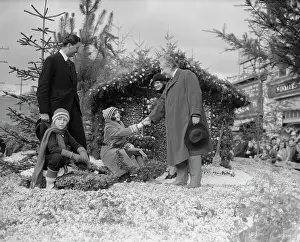 Prints of (Original Caption). Albert Einstein greeting children. With him are Gustav Struve, German Consul and Mrs. Georgia Chobe A Glimpse into Genius: Albert Einstein with Gustav Struve and Georgia Chobe