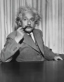 Princeton Prints: Albert Einstein Smoking Pipe at Table