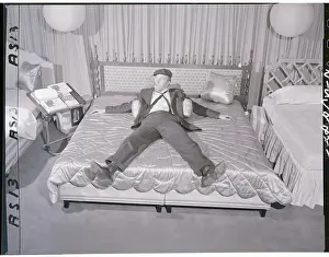 Albert Salmi Relaxing on a Bed