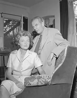 Easy Chair Prints: Aldous and Laura Huxley Sitting on Chair