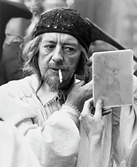 Alec Guinness Looking in Mirror