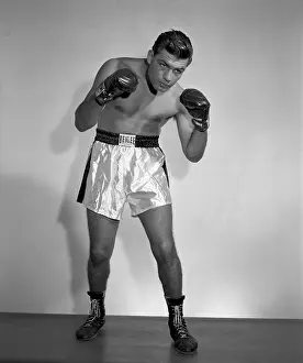 Prints of BRONX, NY - CIRCA 1960: Heavyweight professional boxer Alex Miteff of Argentina poses for a portrait circa 1960 in the Bronx, New York. (Photo by Stanley Weston/Getty Images) In the Ring: The Art of Boxing: Alex Miteff