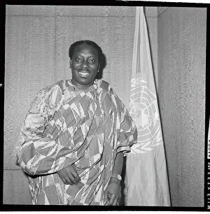 Alex Quaison Sackey Standing Next to United Nations Flag