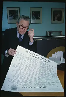 Alexander Cohen Holding Poster
