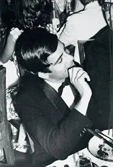 Alexander Onassis Holding His Head Down at Show