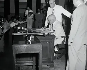 Alexander Smith Signing an Agreement