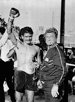 Alexis Arguello Standing with Trainer