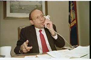 Alfonse D'Amato Speaking on Telephone