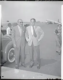 Alfred Knopf Sr. and Son Standing on Airport Runway