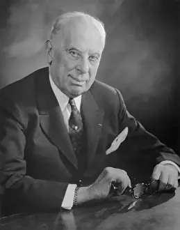 Alfred P Prints: Alfred P. Sloan Jr. Sitting at Desk