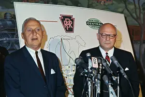 Alfred Perlman and Stuart Saunders Standing in Front of a Map