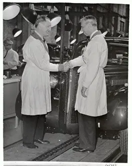 Alfred P Prints: Alfred Sloan Shaking Hands with Buick Pres