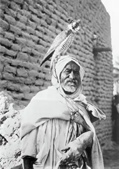 Headscarf Prints: Algerian Falconer Holding Falcon on his Head
