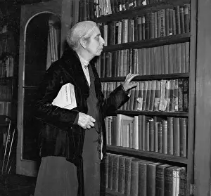 Bookshelf Prints: Alice Stone Blackwell Looking Through Bookshelf