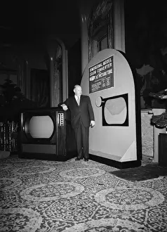Carpet Prints: Allen B. Dumont Stands Next to TV