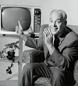Allen Funt Pointing to a Television