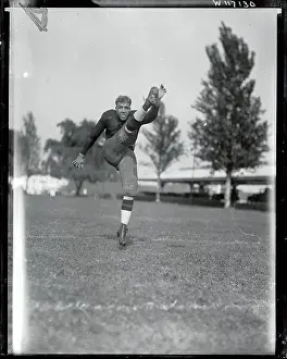 Allen Shapely Kicking Football