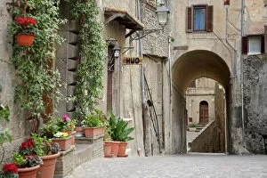 Images Dated 18th March 2012: Alley with flowers in pots in Bracciano, Italy