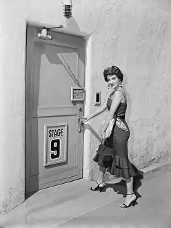 Allison Hayes Walking to a Door