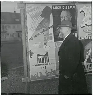 Munich Prints: Alois Hundhammer Walking Past Posters