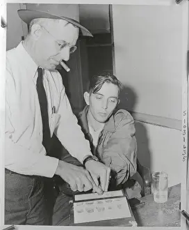 Mobile Prints: Alonzo Ellis Jones Being Fingerprinted