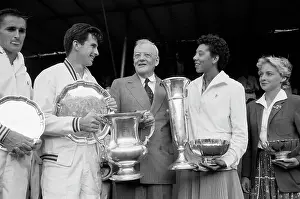 Althea Gibson and Ashley Cooper with Trophies