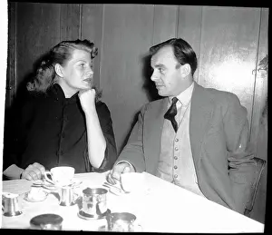 Aly Khan Looks Over to Rita Hayworth