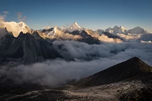 Khumbu Gallery: Ama Dablam mountain peak with sea of mist, Everest region