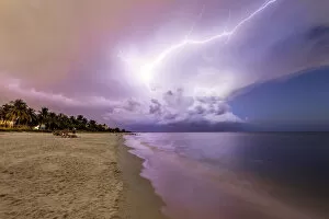 Lightning Storms Gallery: Amazing lightning storm sunset and calmed ocean, at Naples beach, Florida, USA