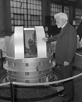 Ambrose Swasey with Scale Model of His Telescope
