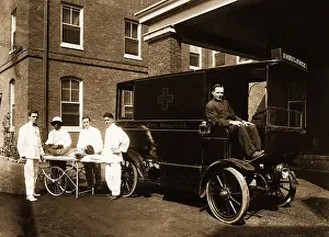 Ambulance and Driver with Hospital Employees at Hospital Entrance