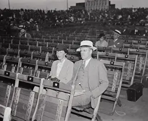 Amelia Earhart and George Putnam Watching Bout