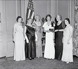 Amelia Earhart Holding Medal
