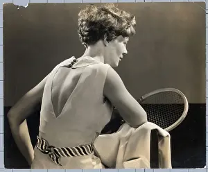 Amelia Earhart Holding Tennis Racket