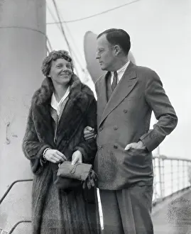 Amelia Earhart and Husband Posing Together
