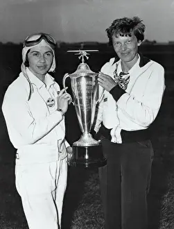 Amelia Earhart Presenting Trophy to Melba Beard