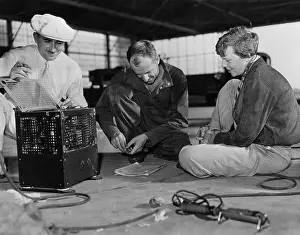 Exploration Prints: Amelia Earhart Sitting with Flight Specialist