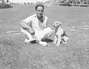 Legs Crossed Prints: American Actor Douglas Fairbanks and His Dog