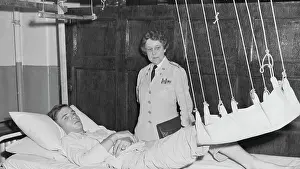 American Army Nurse with Soldier as Patient
