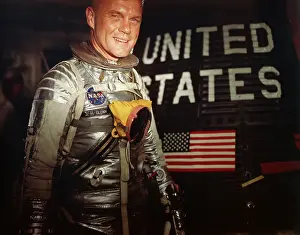 Nasa Prints: American Astronaut John Glenn Entering Capsule