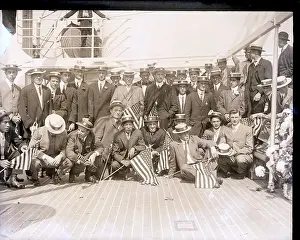 Prints of (Original Caption) 1912-Photo shows American athletes on the deck of a ship as they travel to Sweden for the 1912 Olympic Games Capturing Glory: A Journey Through Olympic History: American Athletes on Ship