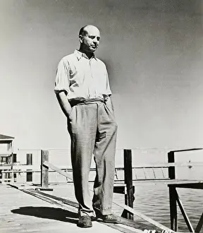 American Author John Dos Passos Pausing on Pier