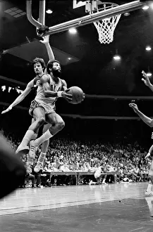 Prints of American basketball player Norm Van Lier playing for the Chicago Bulls at the Chicago Stadium, Chicago, Illinois during the 1976-1977 NBA season Courtside Vibes: Stunning Basketball Prints: American basketball player Norm Van Lier playing for the Chicago Bulls at the Chicago Stadium