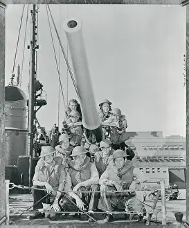 Hawaii Prints: American Gunner Men Posing on Deck Beside Barrel