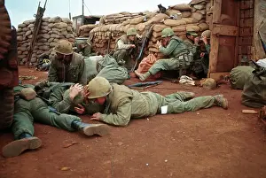 Land Battle Prints: American Marines Take Cover During Vietnam War