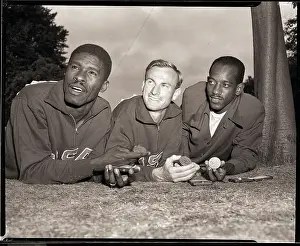 Track Prints: American Olympic Winners Showing Medals