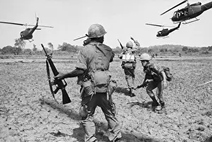 Bien Hoa Prints: American Paratroopers in field Below Helicopters in South Vietnam