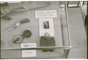 Russian Text Prints: American Pilot's Equipment Displayed in Moscow