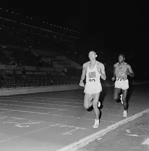Decathlon Prints: American Rafer Johnson and Taiwanese C.K. Yang Finishing Race
